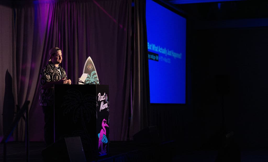 Braydon on stage at React Miami 2026.